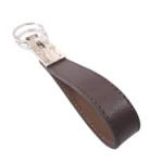 جاکلیدی چرمی مدل 2 حلقه قهوه ای مشکی با پس زمینه سفید