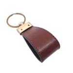 جاکلیدی چرمی مدل کارن رنگ زرشکی با پس زمینه سفید