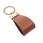 جاکلیدی چرمی مدل کارن رنگ عسلی با پس زمینه سفید