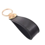 جاکلیدی چرمی مدل بیضی رنگ مشکی با پس زمینه سفید