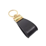 جاکلیدی چرمی مدل کیارا رنگ مشکی با پس زمبنه سفید