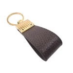 جاکلیدی چرمی مدل کیارا رنگ قهوه ای فلوتر با پس زمبنه سفید