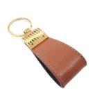 جاکلیدی چرمی مدل کیارا رنگ عسلی با پس زمبنه سفید