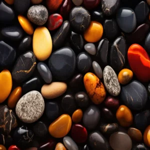 نمای نزدیک از سنگ‌های ریز اونیکس مشکی و چشم‌ببر با تمرکز بر سطح صیقلی و جلوه نوری